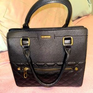 Brand new black leather hand bag from macys